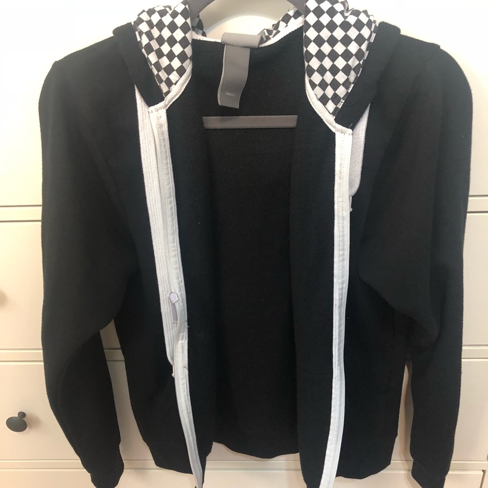 Zip up jacket with checkered print Hood.